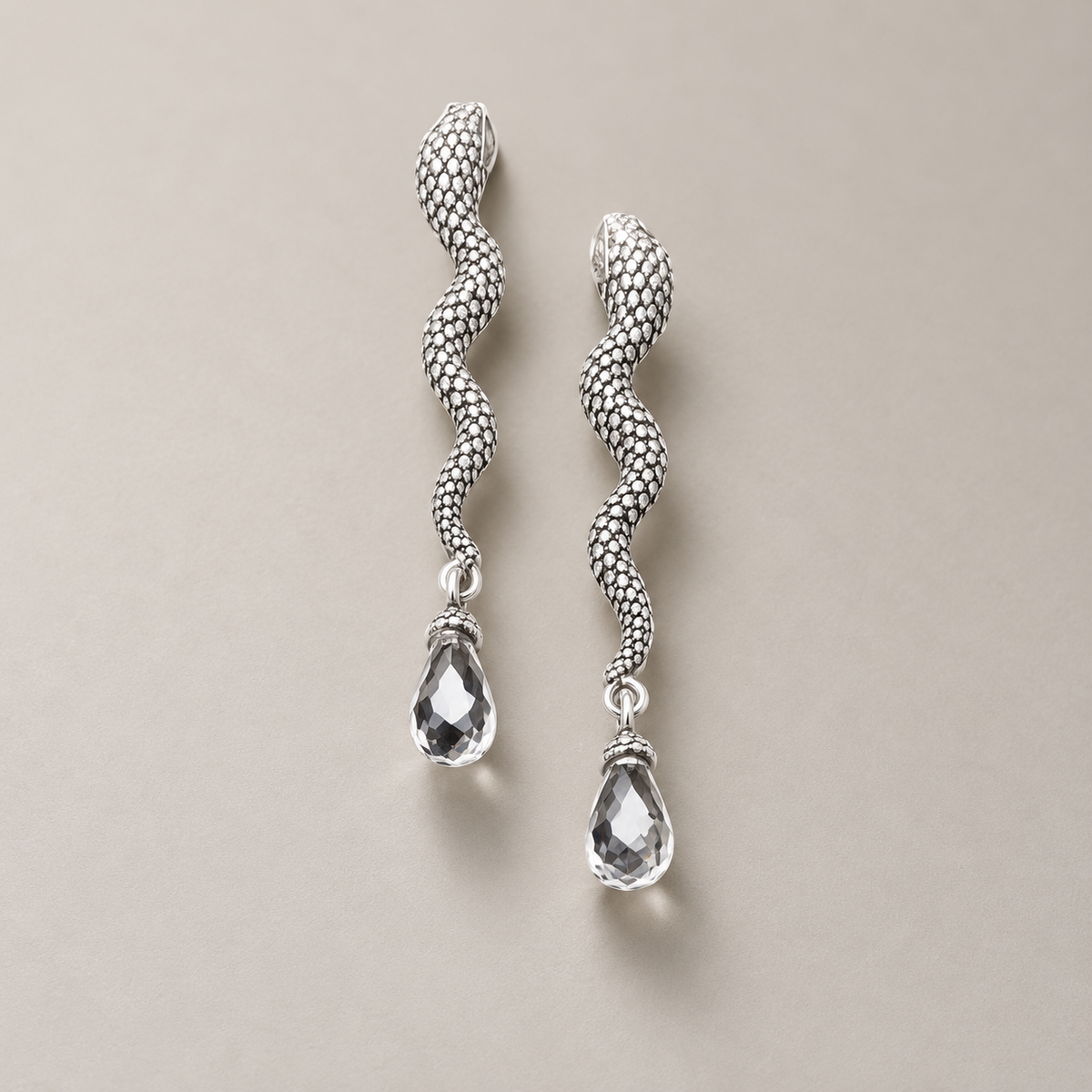 SERPENT FALL — studio shadow view of Noctara jewelry